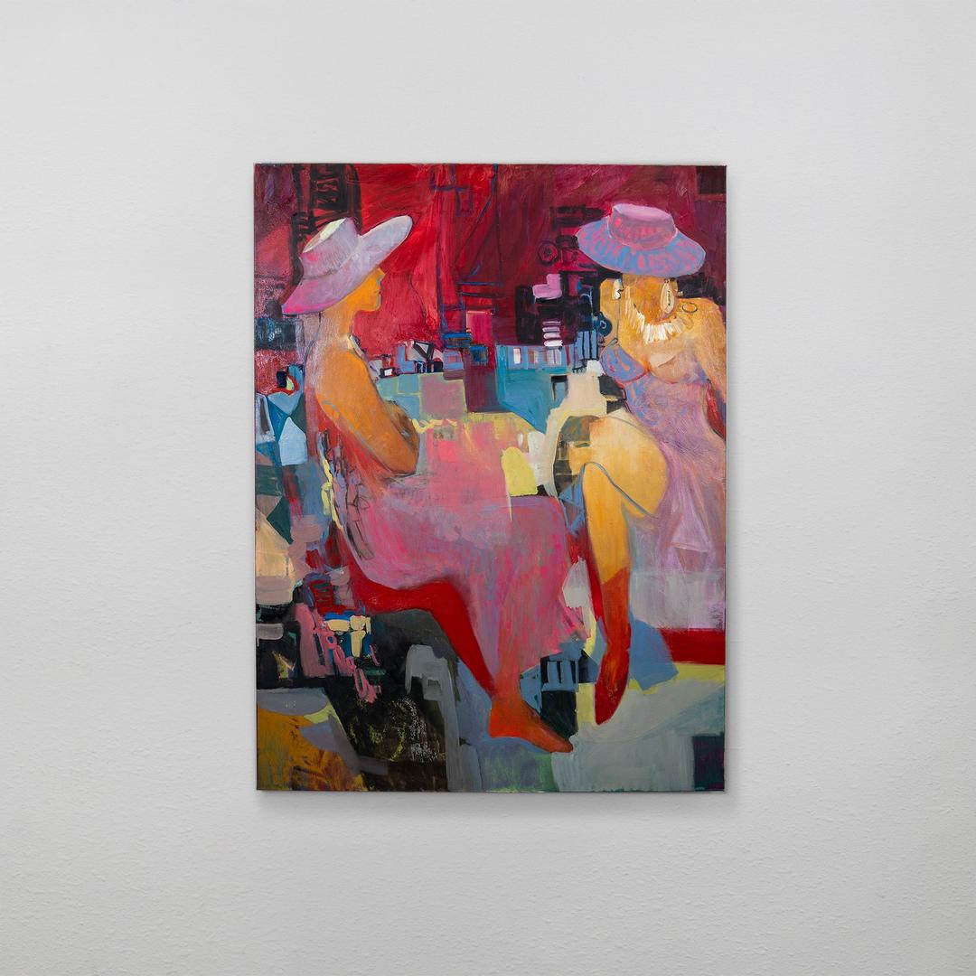Abstract painting showing two figures in hats with vibrant pink, red, and blue hues.